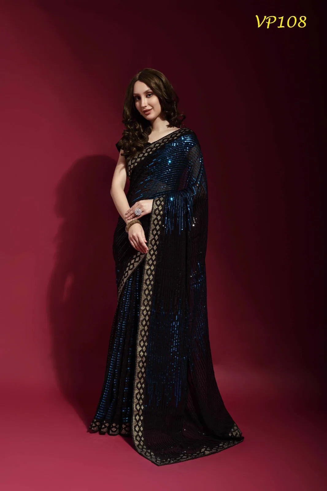 BLUE SEQUENCE WORK ON BLACK SAREE - RENT